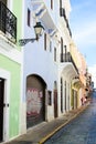 Pastel colored spanish colonial buildings along Old San Juan Puerto Rico street