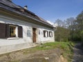 Old sand stone cottage and footpath on the countryside in spring Royalty Free Stock Photo