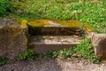 Old sandstone steps leading into the grass