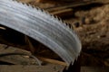 Old saw blade and wood Royalty Free Stock Photo