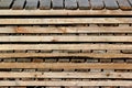 Old sawn timber material - stack of weathered wooden planks Royalty Free Stock Photo