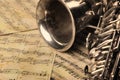 Old saxophone and notes Royalty Free Stock Photo