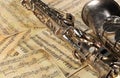 Old saxophone and notes Royalty Free Stock Photo