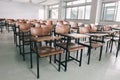 Old scattered chairs in the classroom.Student chair