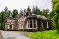 An old scenic house on a territory of Benmore Botanic Garden, Scotland Royalty Free Stock Photo