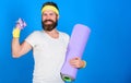 Old school aerobics concept. Athlete wear bandages for sweat. Athlete guide stay in shape. Man bearded athlete hold