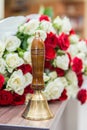 Old school bell with yellow flowers Royalty Free Stock Photo