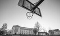 Old school building, and basketball hoop black and white potography