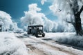 an old school bus is driving down a snowy road