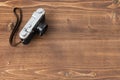 Old school camera on wooden background Royalty Free Stock Photo