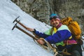 Old school climber in vintage clothes and with vintage equipment Royalty Free Stock Photo