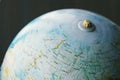 Old school globe on Russian language with Eurasia, Moscow, back to school, geography background Royalty Free Stock Photo