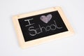 Old school slate blackboard with text heart i love on grey background Royalty Free Stock Photo