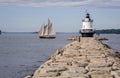 Schooner Passes By Maine Lighthouse Royalty Free Stock Photo