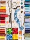 Old scissors, buttons, threads, measuring tape and sewing supplies. Top view. Royalty Free Stock Photo