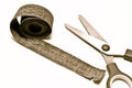 Old scissors and tape measure Royalty Free Stock Photo