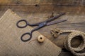 Old scissors on wood Royalty Free Stock Photo