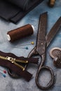 Old scissors, zipper for clothes and other tools for sewing and minor repairs