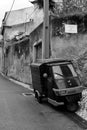 Old scooter. Black and white. b&w Streets of Almada. Portugal. Old town historic buildings. Europe. Travel. Tourism.