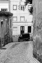 Old scooter. Black and white. b&w Streets of Almada. Portugal. Old town historic buildings. Europe. Travel. Tourism.