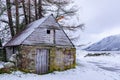 Old Scottish house in a beautiful snowy Cairngorm mountains. Royalty Free Stock Photo