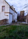 An Old Scottish House Beside an Older Castle Tower Royalty Free Stock Photo