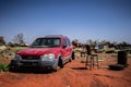 Old scrap car in the middle of desert Royalty Free Stock Photo
