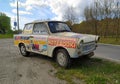 Old wreck scrap plastic cheap car Trabant 601 parked