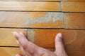 Old, scratched parquet flooring needs maintenance. the parquet is damaged by scratches from prolonged use. Master's Royalty Free Stock Photo