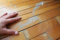 Old, scratched parquet flooring needs maintenance. the parquet is damaged by scratches from prolonged use. Master's Royalty Free Stock Photo