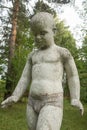 Old sculpture of children In an abandoned pioneer camp