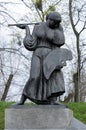 Old sculpture of painter in the park in Kyiv Ukraine