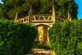 Old sculpture on the pedestal, beautifully preserved old artistic figure, decorative elements on the outside