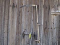 Old scythe on a wood wall Royalty Free Stock Photo