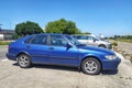 Old sedan car blue Saab 9.3 with 2.0 engine