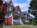 old semi-detached houses with large porches and gables Royalty Free Stock Photo