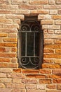 old semicircular window with bars Royalty Free Stock Photo