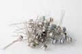 Old semiconductor transistors from Soviet technology on a white background Royalty Free Stock Photo