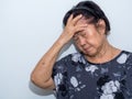 Old senior woman suffering and covering face with hands in headache and deep depression. emotional disorder, grief and desperation Royalty Free Stock Photo