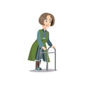 Old senior woman walking with metal walker at home Royalty Free Stock Photo