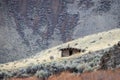 An old settlerÃ¢â¬â¢s cabin sitting on the side of a mountain in Idaho