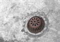 Old sewer grate drain water Royalty Free Stock Photo