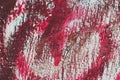 Old shabby background with peeling red paint in chaotic order on a light-colored wooden texture, as well as brown and pink tones Royalty Free Stock Photo