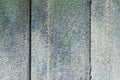 Old shabby flaky wooden wall painted pale blue and green Royalty Free Stock Photo