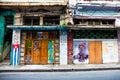 Old shabby house with paintings in Old Havana