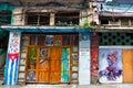 Old shabby house with paintings in Old Havana