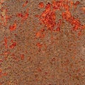 Old shabby rusty metal wall. Shabby, cracked brown paint. Grunge background Royalty Free Stock Photo