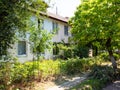 old shabby two-storey municipal house in town Royalty Free Stock Photo