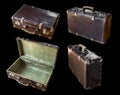 Old shabby vintage suitcase isolated on black background. Retro style Royalty Free Stock Photo