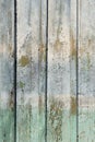 Old shabby vintage wooden wall painted pale blue and green Royalty Free Stock Photo